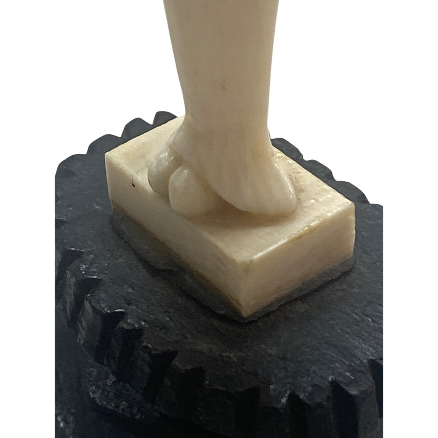 Carved Ivory Look Figurine Of Saint On Black Base