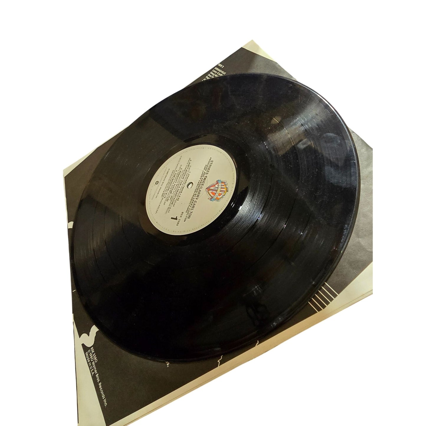 Larry Carlto "Strikes Twice