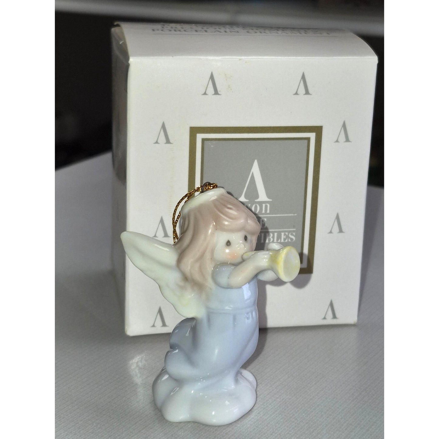 Avon Fine Collectibles 1996 Angel Ornament With Trumpet Porcelain Figurine