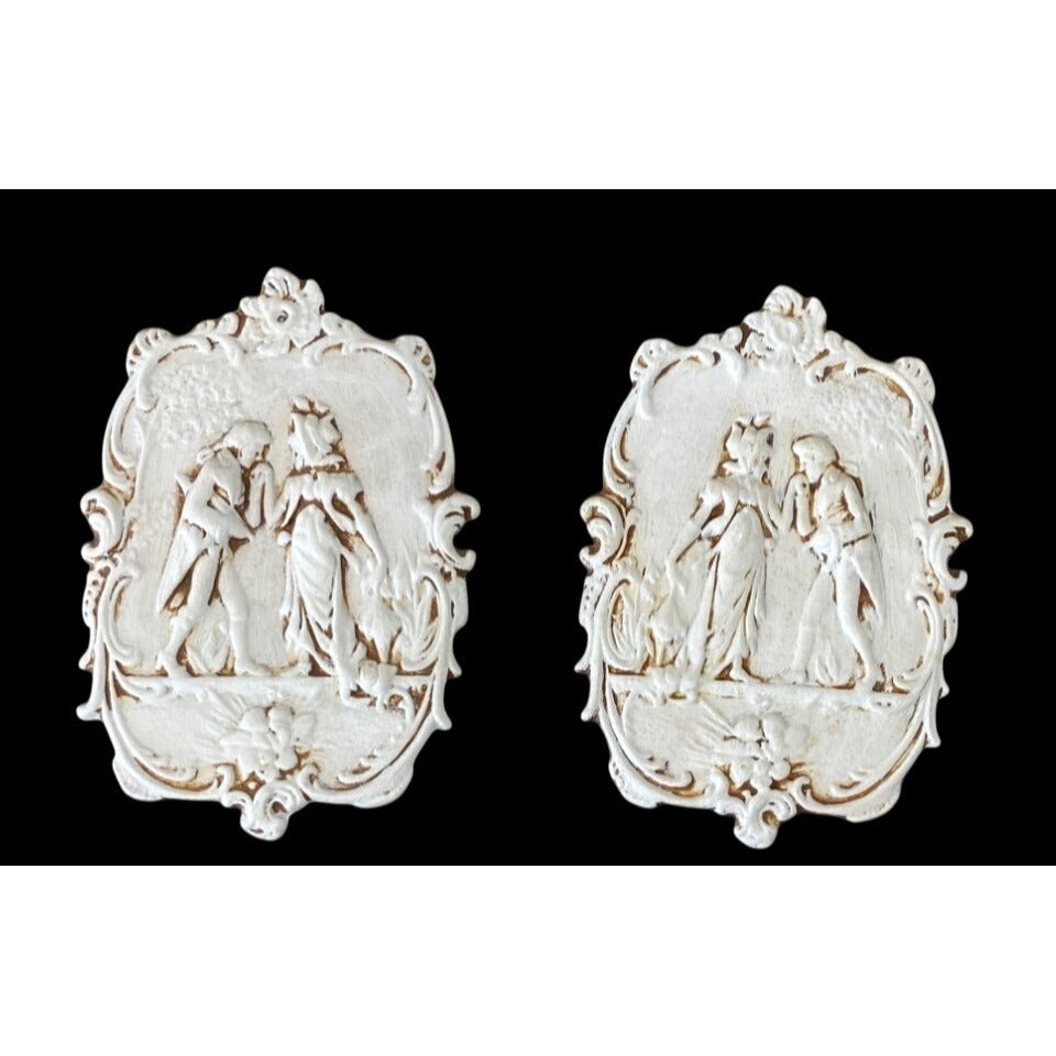 Romantic Bisque Ceramic Relief Plaques – Classical Pair with Cherub-Inspired Ornamentation