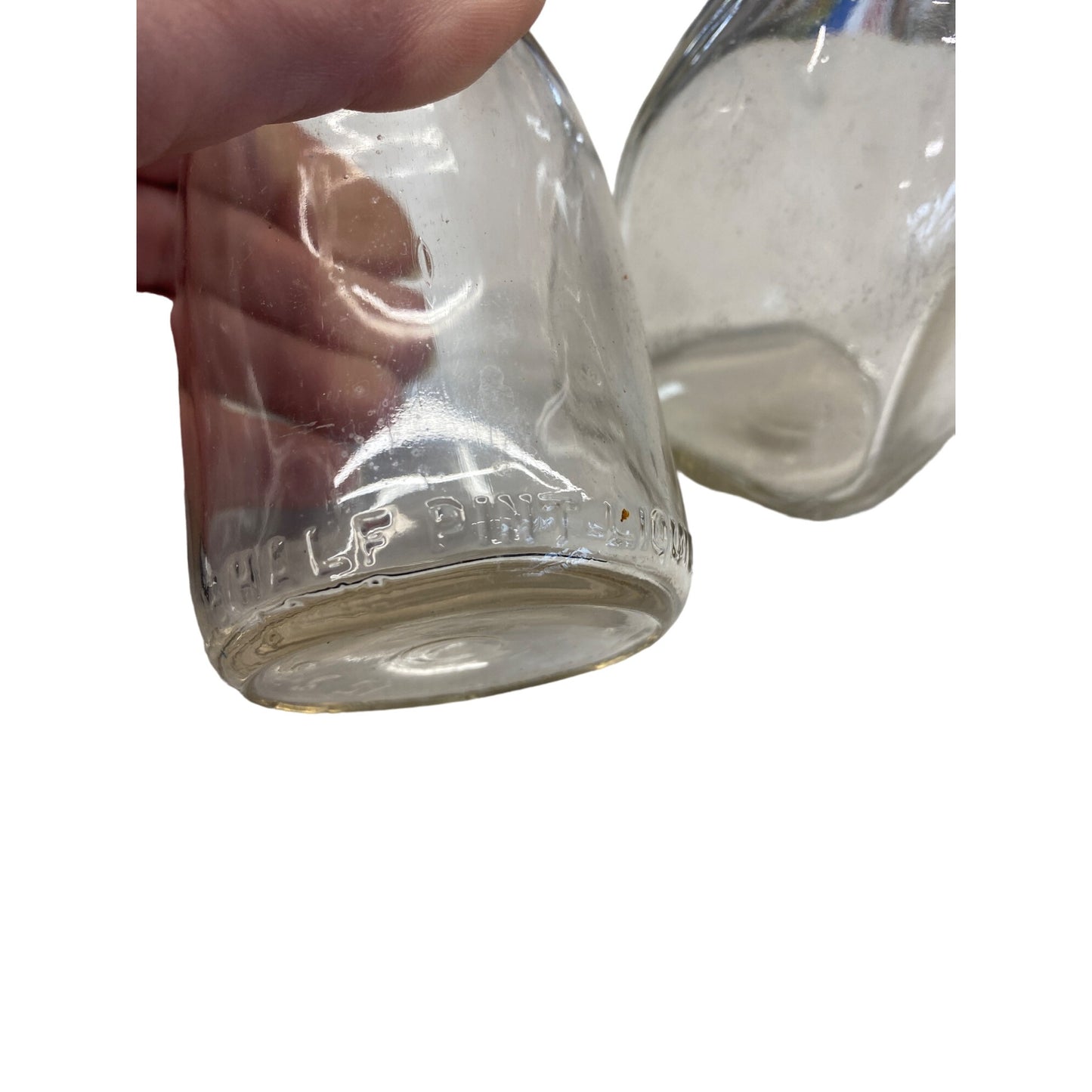 Vintage Clear Glass Milk Bottles Set Of 2 With Embossed Base & Unique Shape