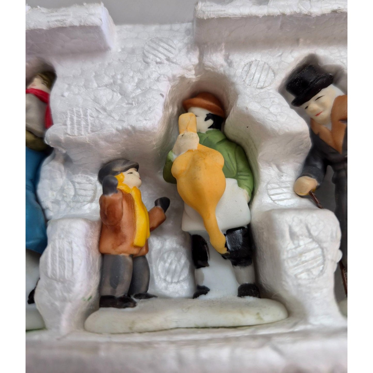 Handpainted Porcelain "A Christmas Carol" Figurines Set Featuring Bob Cratchit Tiny Tim Boy With Polterer & Scrooge
