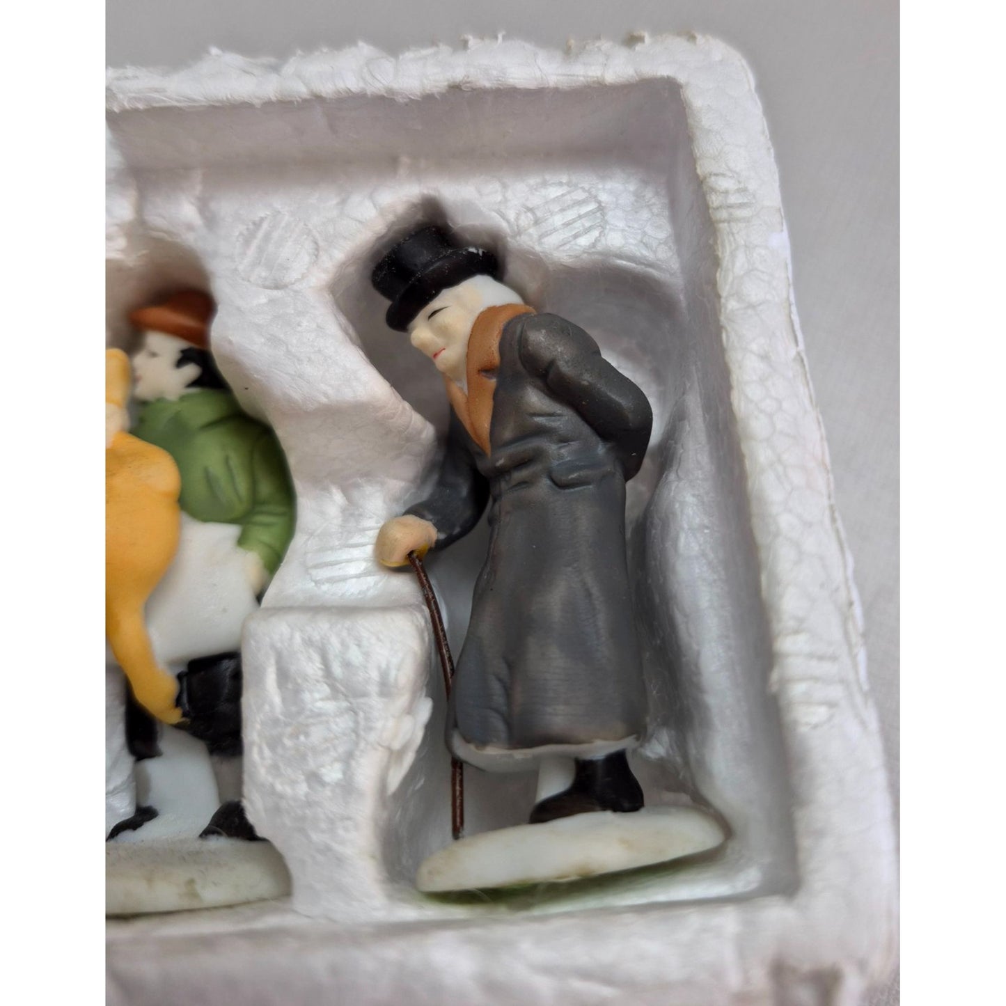 Handpainted Porcelain "A Christmas Carol" Figurines Set Featuring Bob Cratchit Tiny Tim Boy With Polterer & Scrooge