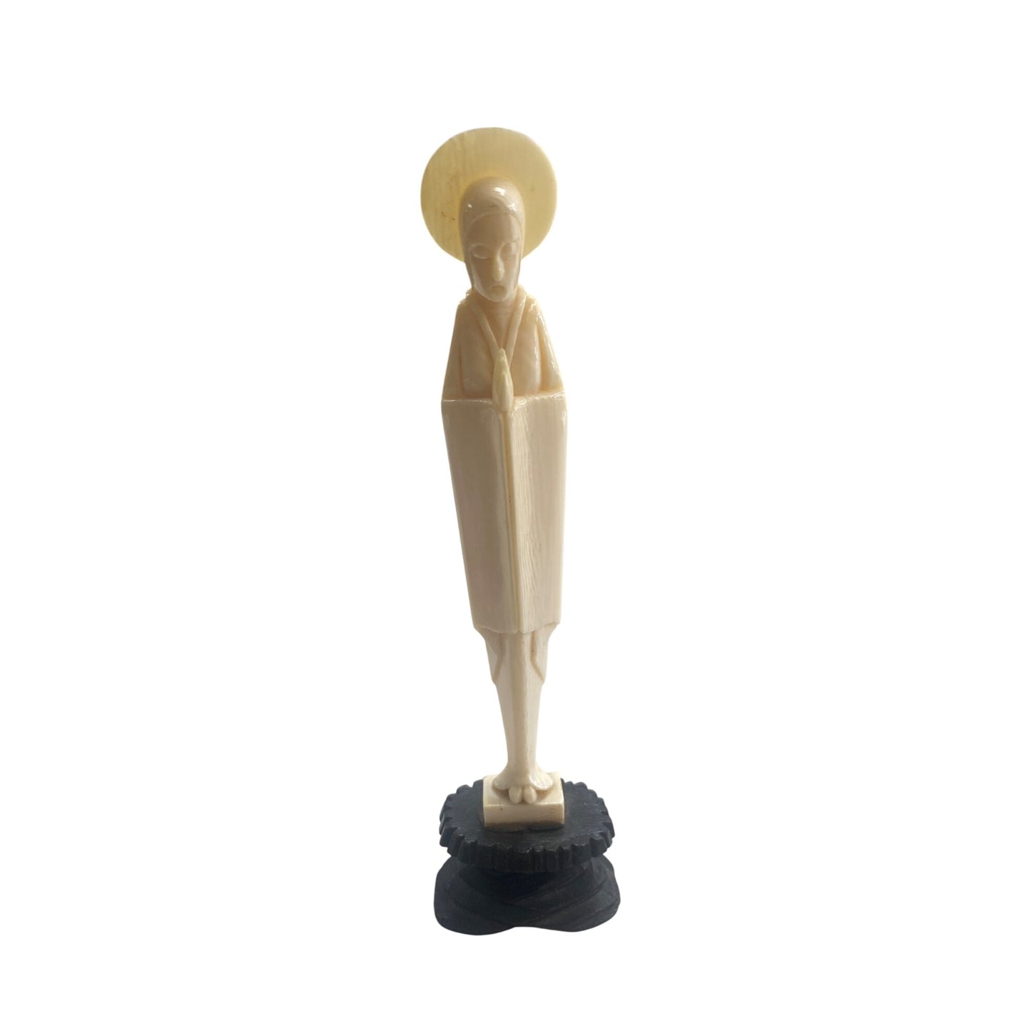 Carved Ivory Look Figurine Of Saint On Black Base