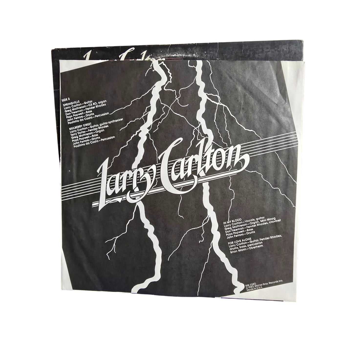 Larry Carlto "Strikes Twice