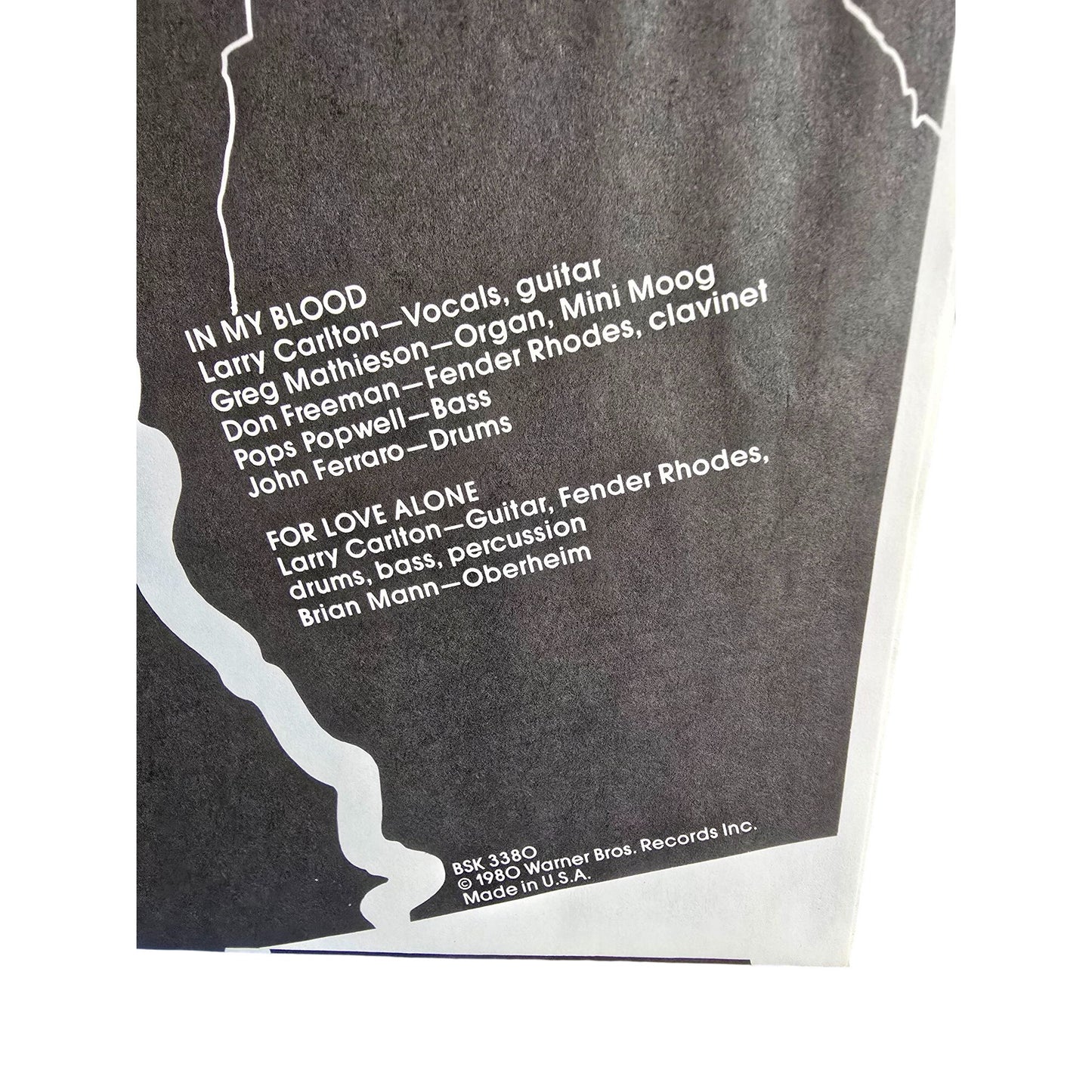 Larry Carlto "Strikes Twice