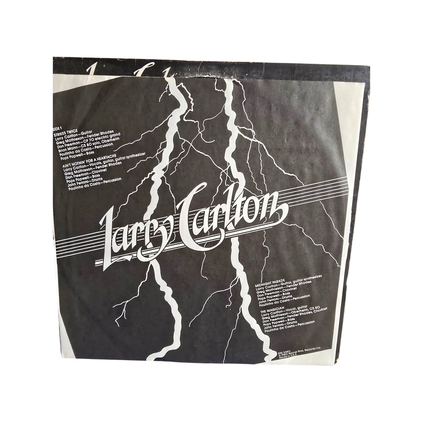 Larry Carlto "Strikes Twice