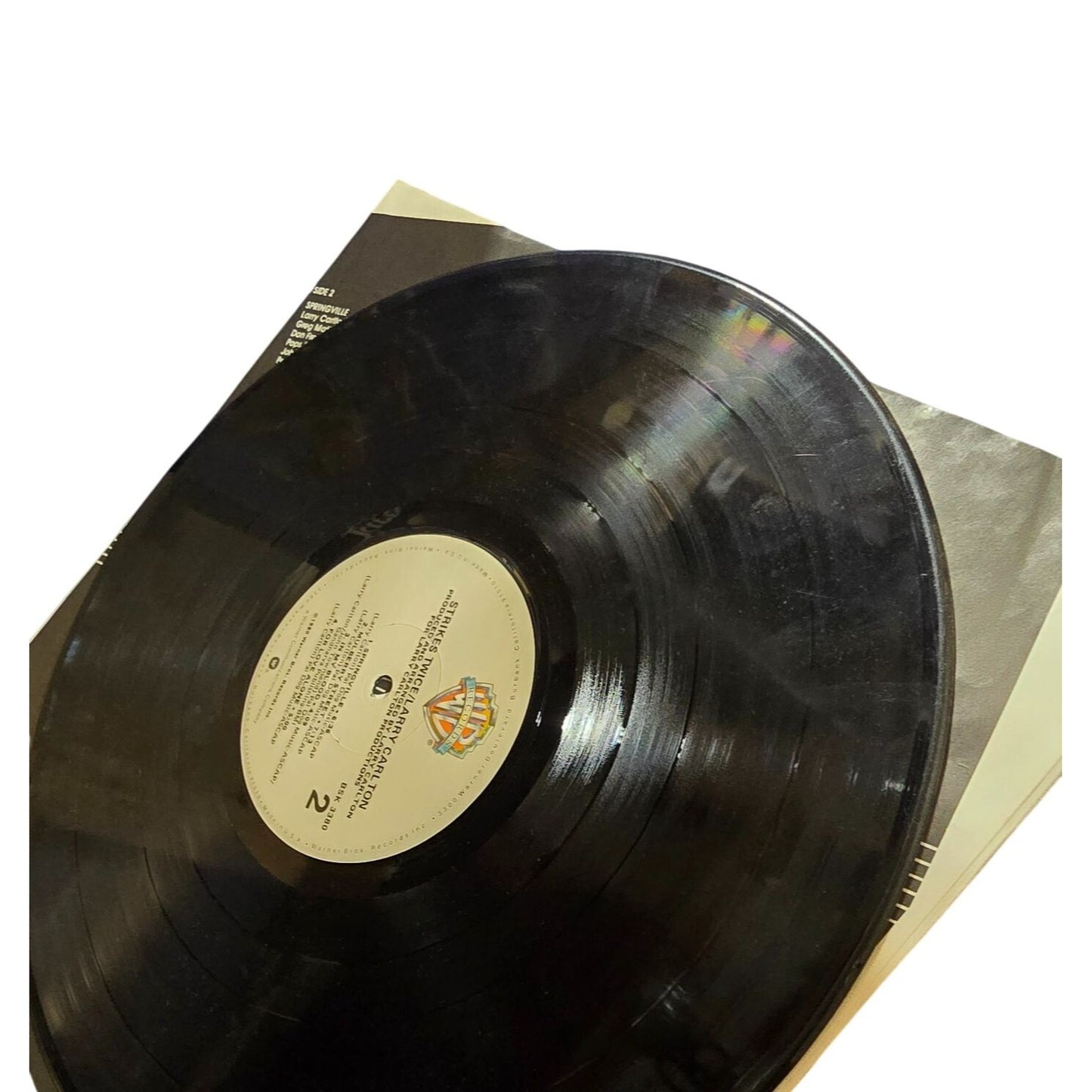 Larry Carlto "Strikes Twice